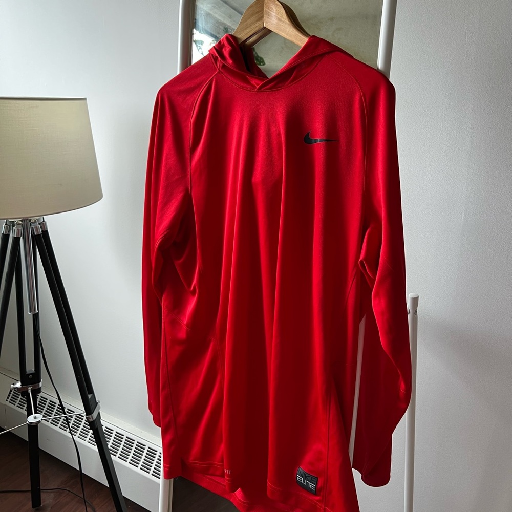Nike Dry Fit Red Long-sleeve with a hood.